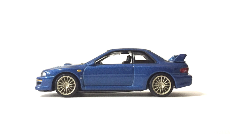 Illustration for article titled Scooby Saturday - Subaru Impreza 22B STI 1/64 by Carisma